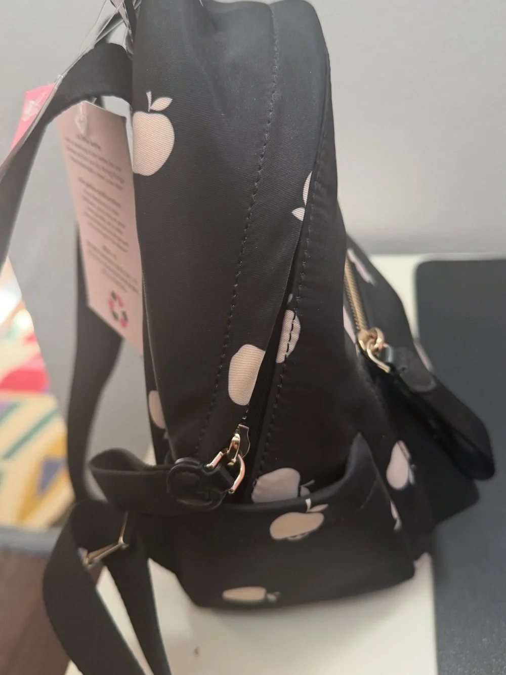 kate spade Black Mini Backpack with Pale Pink Apple Motif